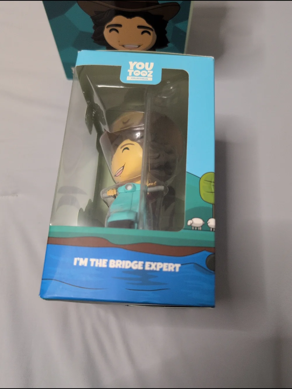 Builder Kryoz Vinyl Figure - Teal and Brown Collectible Toy